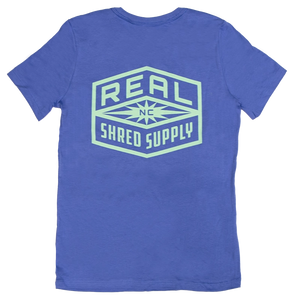 REAL Wmn's Shred Supply Tee-Lavender Blue